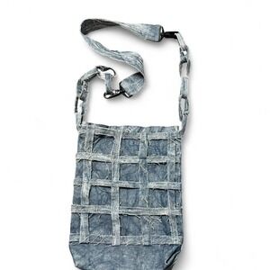 custom handmade denim bag with adjustable chain strap and button closure